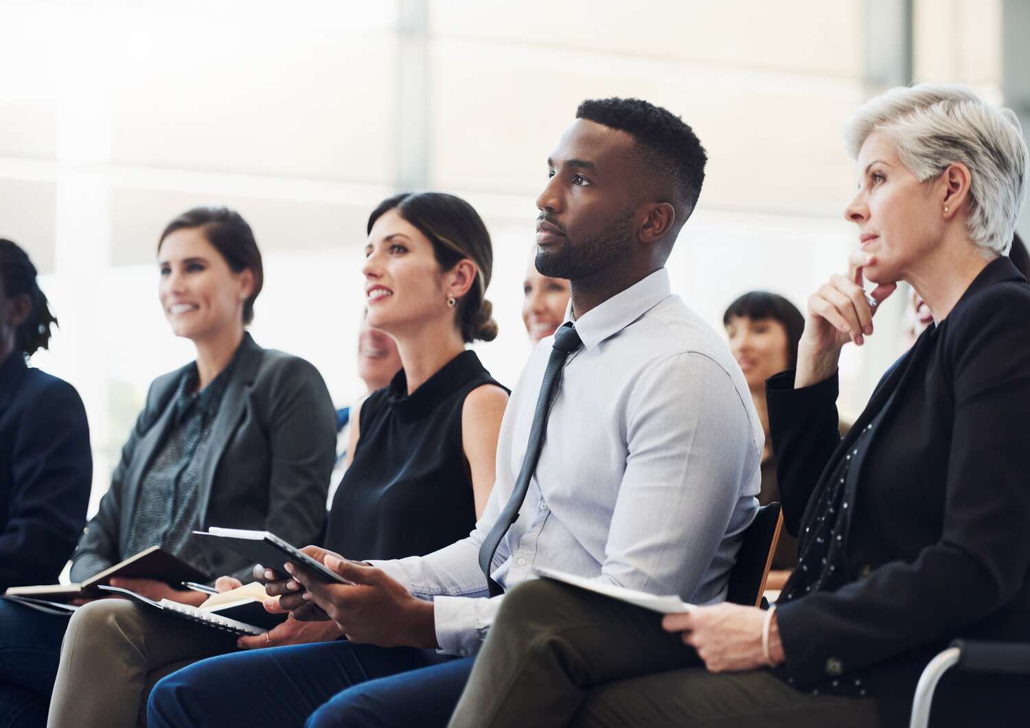 A group of attendees during a conference supported by CTI Meeting Technology.